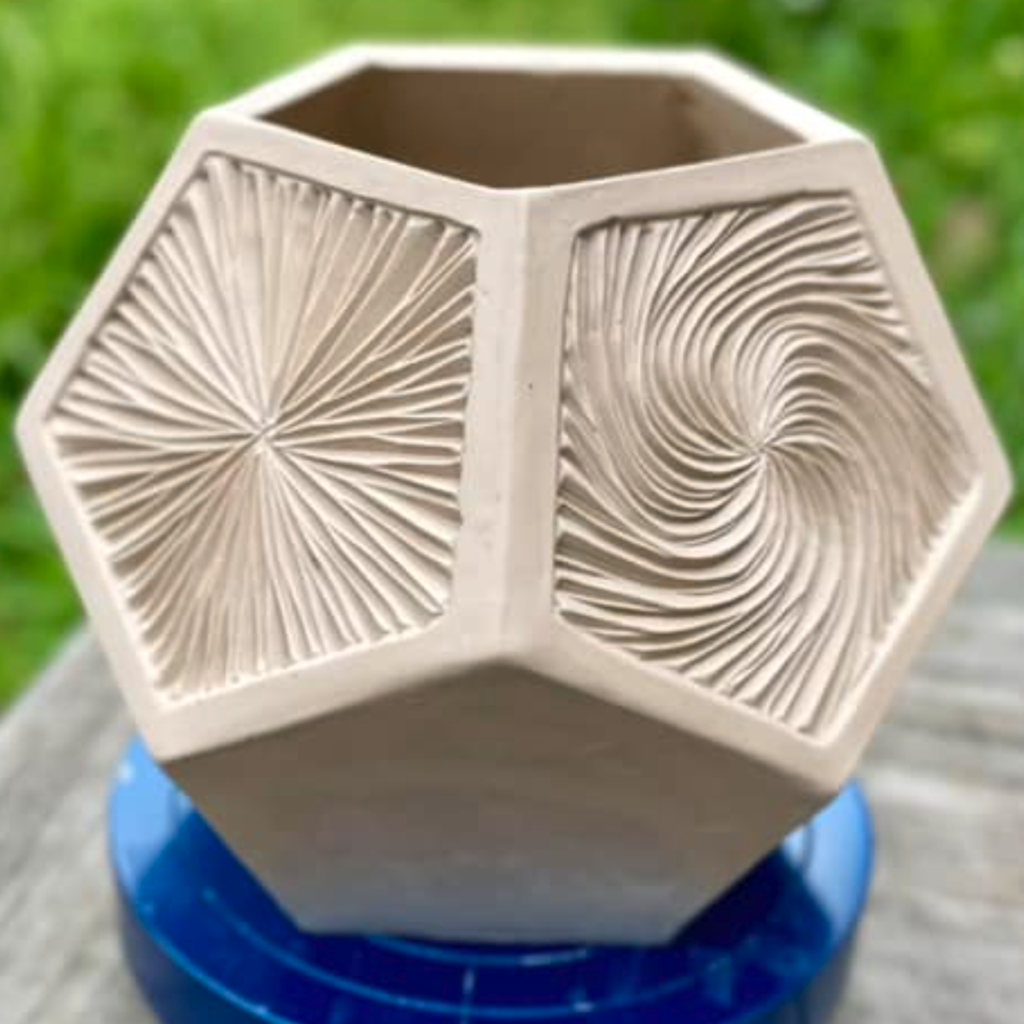 carved ceramic dodecahedron